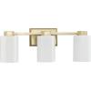 Progress Lighting Estrada 22.37 in. Three-Light Brushed Gold Vanity Light with Opal Glass Shade