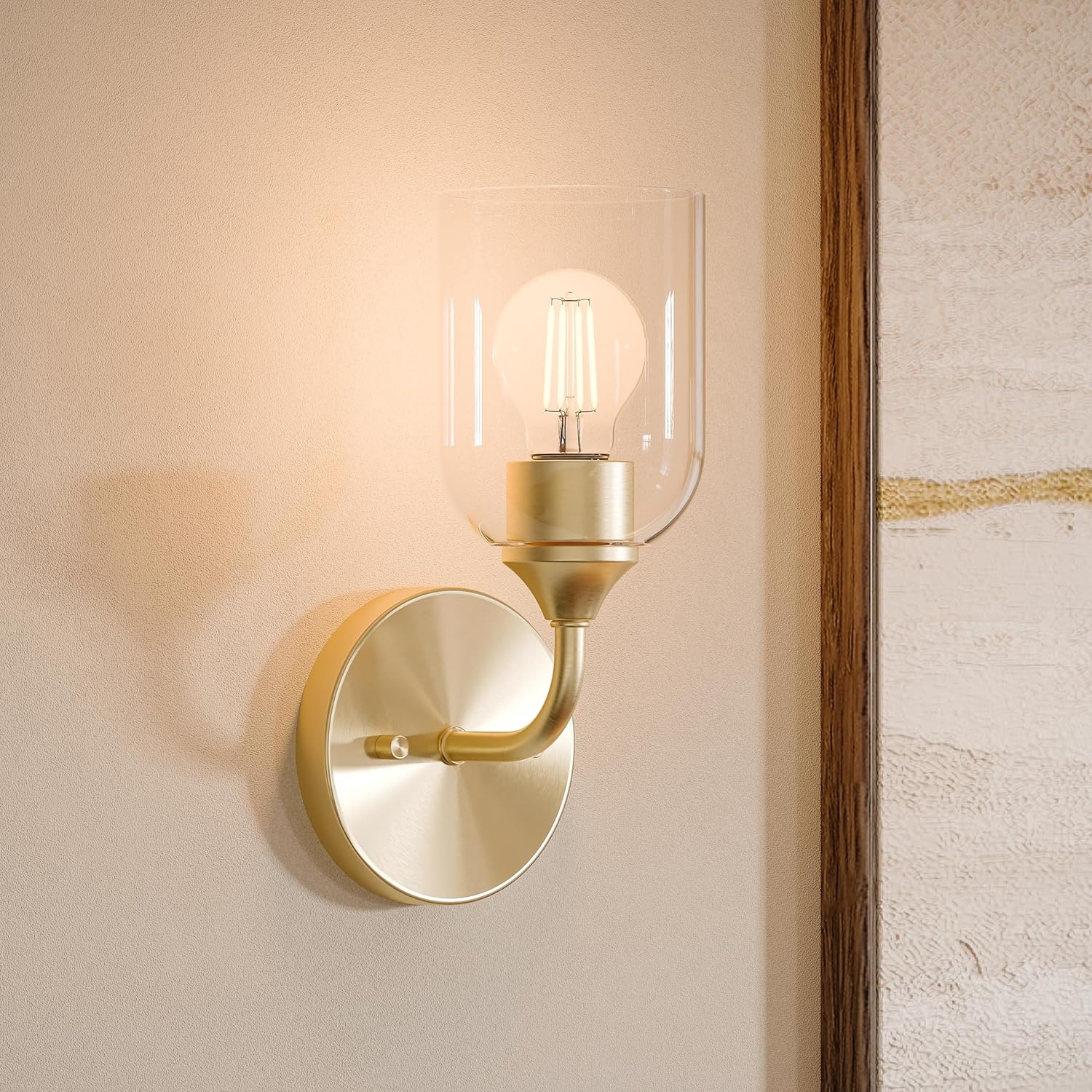 image:imageProgress Lighting Ilia 1Light Wall Sconce Transitional Wall Sconce Brushed Gold with Clear Glass Shade 11 in H x 5 in W x 6 in Dia P710155191